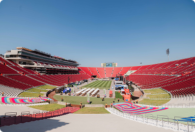 Wide view of FIFA Fan Fest at the Los Angeles Memorial Coliseum featuring custom event branding, field graphics, and fan activation areas produced by A3 Visual.